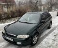 Зеленый Мазда 323, объемом двигателя 1.5 л и пробегом 240 тыс. км за 3600 $, фото 1 на Automoto.ua