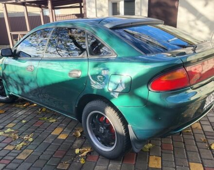 Зеленый Мазда 323, объемом двигателя 1.5 л и пробегом 270 тыс. км за 2199 $, фото 3 на Automoto.ua