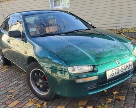 Зеленый Мазда 323, объемом двигателя 1.5 л и пробегом 270 тыс. км за 2199 $, фото 1 на Automoto.ua