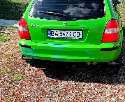 Зеленый Мазда 323, объемом двигателя 1.3 л и пробегом 254 тыс. км за 1900 $, фото 2 на Automoto.ua