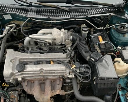 Зелений Мазда 323, об'ємом двигуна 1.5 л та пробігом 270 тис. км за 2000 $, фото 5 на Automoto.ua