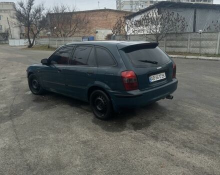 Зеленый Мазда 323, объемом двигателя 1.5 л и пробегом 400 тыс. км за 1500 $, фото 3 на Automoto.ua