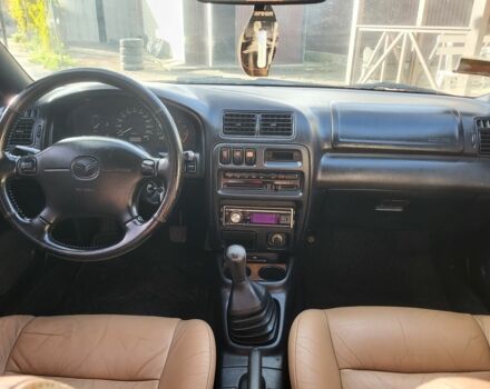 Зеленый Мазда 323, объемом двигателя 1.5 л и пробегом 270 тыс. км за 2199 $, фото 6 на Automoto.ua