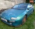 Зеленый Мазда 323, объемом двигателя 2 л и пробегом 268 тыс. км за 1600 $, фото 1 на Automoto.ua