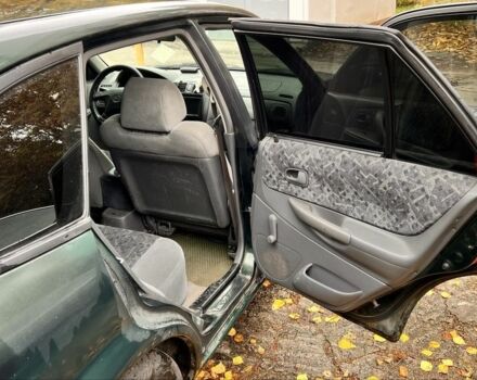 Мазда 323 1999 в Киеве на Automoto.ua Зеленый Мазда 323, объемом двигателя 1.5 л и пробегом 350 тыс. км за 2400 $, фото 9 на Automoto.ua