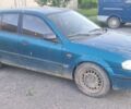Зеленый Мазда 323, объемом двигателя 1.7 л и пробегом 228 тыс. км за 700 $, фото 1 на Automoto.ua