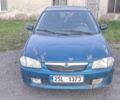 Зеленый Мазда 323, объемом двигателя 1.7 л и пробегом 225 тыс. км за 602 $, фото 1 на Automoto.ua