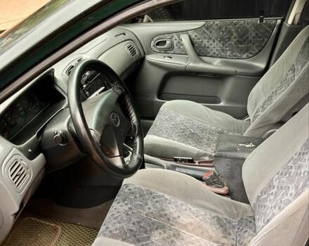 Мазда 323 1999 в Киеве на Automoto.ua Зеленый Мазда 323, объемом двигателя 1.5 л и пробегом 350 тыс. км за 2400 $, фото 12 на Automoto.ua