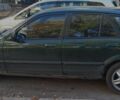 Зеленый Мазда 323, объемом двигателя 1.8 л и пробегом 200 тыс. км за 809 $, фото 1 на Automoto.ua