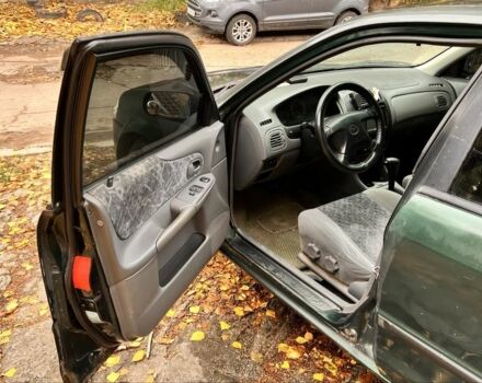 Мазда 323 1999 в Киеве на Automoto.ua Зеленый Мазда 323, объемом двигателя 1.5 л и пробегом 350 тыс. км за 2400 $, фото 11 на Automoto.ua