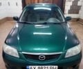 Зеленый Мазда 323, объемом двигателя 1.5 л и пробегом 380 тыс. км за 2600 $, фото 1 на Automoto.ua