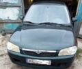 Зеленый Мазда 323, объемом двигателя 1.8 л и пробегом 290 тыс. км за 599 $, фото 1 на Automoto.ua