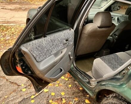 Мазда 323 1999 в Киеве на Automoto.ua Зеленый Мазда 323, объемом двигателя 1.5 л и пробегом 350 тыс. км за 2400 $, фото 10 на Automoto.ua