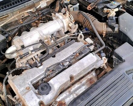 Зеленый Мазда 323, объемом двигателя 1.6 л и пробегом 299 тыс. км за 700 $, фото 4 на Automoto.ua