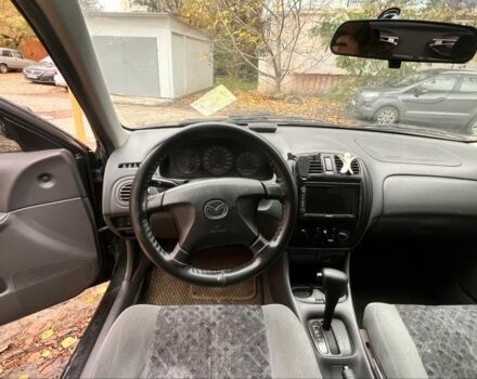 Мазда 323 1999 в Киеве на Automoto.ua Зеленый Мазда 323, объемом двигателя 1.5 л и пробегом 350 тыс. км за 2400 $, фото 14 на Automoto.ua