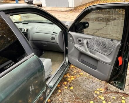 Мазда 323 1999 в Киеве на Automoto.ua Зеленый Мазда 323, объемом двигателя 1.5 л и пробегом 350 тыс. км за 2400 $, фото 8 на Automoto.ua