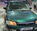Зеленый Мазда 323, объемом двигателя 1.3 л и пробегом 300 тыс. км за 2000 $, фото 1 на Automoto.ua