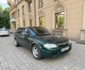 Зеленый Мазда 323, объемом двигателя 1.5 л и пробегом 250 тыс. км за 1850 $, фото 1 на Automoto.ua