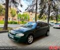 Зеленый Мазда 323, объемом двигателя 1.5 л и пробегом 250 тыс. км за 1850 $, фото 3 на Automoto.ua