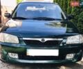 Зелений Мазда 323, об'ємом двигуна 1.5 л та пробігом 179 тис. км за 2900 $, фото 1 на Automoto.ua