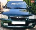 Зелений Мазда 323, об'ємом двигуна 1.5 л та пробігом 179 тис. км за 2900 $, фото 1 на Automoto.ua