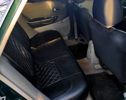 Зеленый Мазда 323, объемом двигателя 2 л и пробегом 210 тыс. км за 3000 $, фото 4 на Automoto.ua