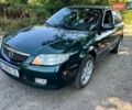 Зелений Мазда 323, об'ємом двигуна 2 л та пробігом 204 тис. км за 4000 $, фото 1 на Automoto.ua