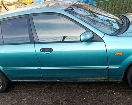 Зеленый Мазда 323, объемом двигателя 1.6 л и пробегом 288 тыс. км за 2000 $, фото 8 на Automoto.ua