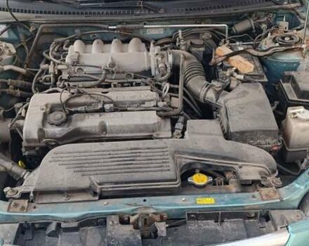 Зеленый Мазда 323, объемом двигателя 1.6 л и пробегом 288 тыс. км за 2000 $, фото 5 на Automoto.ua