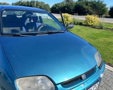 Зеленый Мазда 323, объемом двигателя 1.5 л и пробегом 317 тыс. км за 1300 $, фото 12 на Automoto.ua