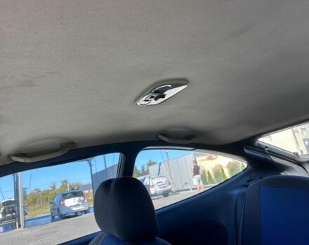 Зеленый Мазда 323, объемом двигателя 1.5 л и пробегом 317 тыс. км за 1300 $, фото 2 на Automoto.ua