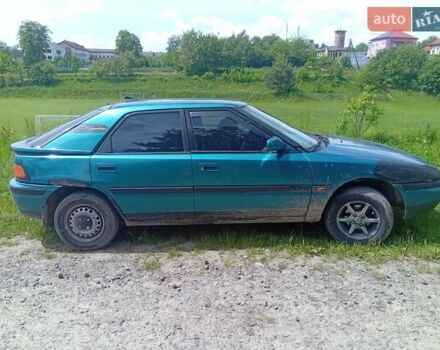 Зелений Мазда 323, об'ємом двигуна 1.6 л та пробігом 450 тис. км за 1300 $, фото 3 на Automoto.ua