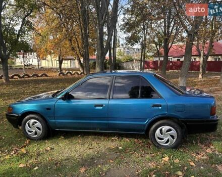 Зеленый Мазда 323, объемом двигателя 1.6 л и пробегом 200 тыс. км за 1000 $, фото 7 на Automoto.ua