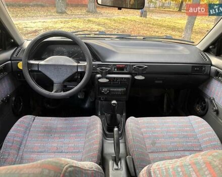 Зеленый Мазда 323, объемом двигателя 1.6 л и пробегом 200 тыс. км за 1000 $, фото 9 на Automoto.ua