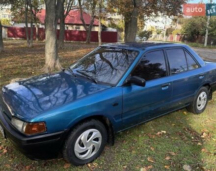 Зеленый Мазда 323, объемом двигателя 1.6 л и пробегом 200 тыс. км за 1000 $, фото 1 на Automoto.ua