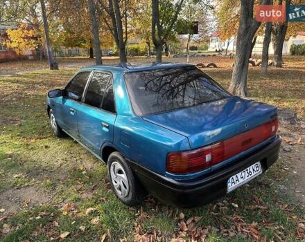 Зеленый Мазда 323, объемом двигателя 1.6 л и пробегом 200 тыс. км за 1000 $, фото 4 на Automoto.ua