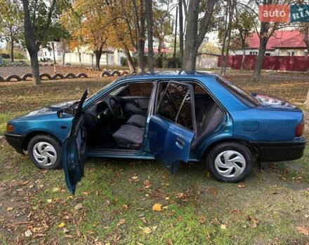 Зеленый Мазда 323, объемом двигателя 1.6 л и пробегом 200 тыс. км за 1000 $, фото 13 на Automoto.ua