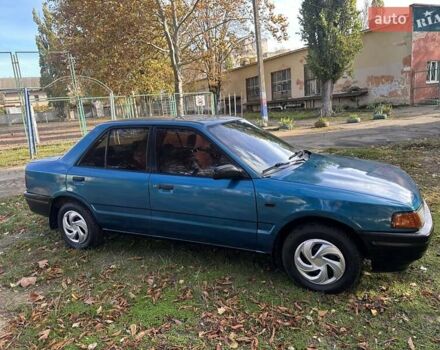 Зеленый Мазда 323, объемом двигателя 1.6 л и пробегом 200 тыс. км за 1000 $, фото 11 на Automoto.ua