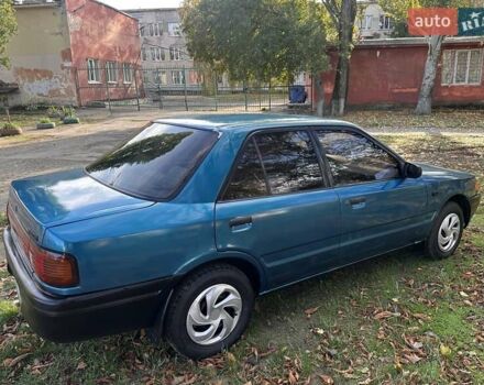 Зеленый Мазда 323, объемом двигателя 1.6 л и пробегом 200 тыс. км за 1000 $, фото 12 на Automoto.ua