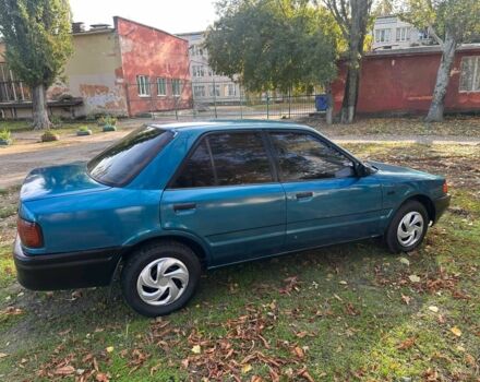 Зелений Мазда 323, об'ємом двигуна 1.3 л та пробігом 200 тис. км за 1250 $, фото 13 на Automoto.ua