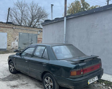 Зеленый Мазда 323, объемом двигателя 1.6 л и пробегом 368 тыс. км за 1200 $, фото 1 на Automoto.ua