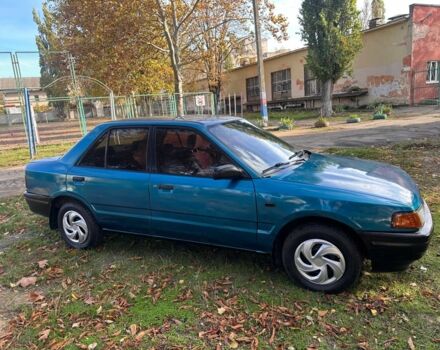 Зелений Мазда 323, об'ємом двигуна 1.3 л та пробігом 200 тис. км за 1250 $, фото 4 на Automoto.ua