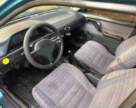 Зелений Мазда 323, об'ємом двигуна 1.3 л та пробігом 200 тис. км за 1250 $, фото 5 на Automoto.ua