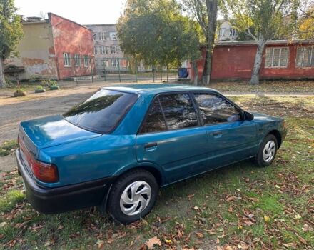 Зелений Мазда 323, об'ємом двигуна 1.3 л та пробігом 200 тис. км за 1250 $, фото 3 на Automoto.ua