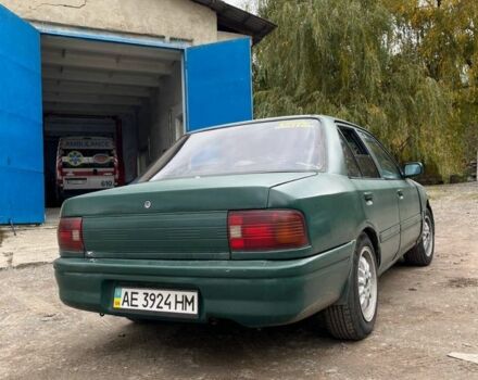 Зеленый Мазда 323, объемом двигателя 1.6 л и пробегом 522 тыс. км за 750 $, фото 5 на Automoto.ua