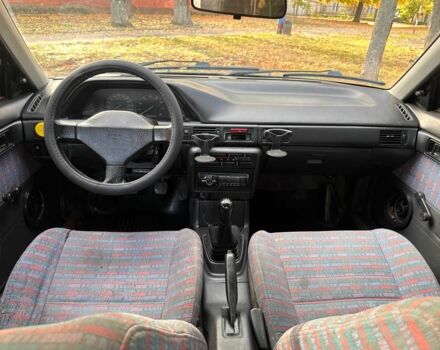 Зелений Мазда 323, об'ємом двигуна 1.3 л та пробігом 200 тис. км за 1250 $, фото 6 на Automoto.ua