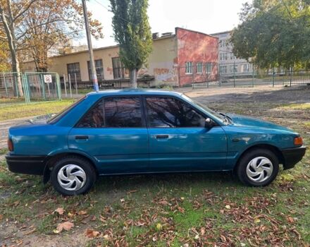 Зелений Мазда 323, об'ємом двигуна 1.3 л та пробігом 200 тис. км за 1250 $, фото 11 на Automoto.ua