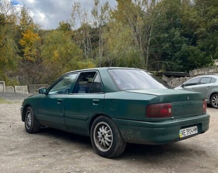 Зеленый Мазда 323, объемом двигателя 1.6 л и пробегом 522 тыс. км за 750 $, фото 3 на Automoto.ua