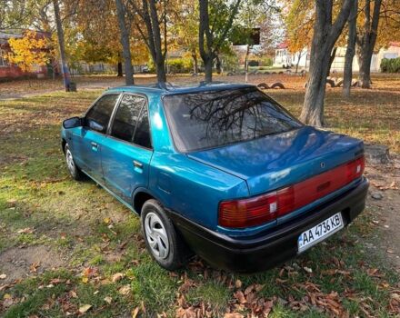 Зелений Мазда 323, об'ємом двигуна 1.3 л та пробігом 200 тис. км за 1250 $, фото 9 на Automoto.ua