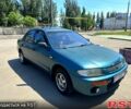 Зелений Мазда 323, об'ємом двигуна 1.3 л та пробігом 244 тис. км за 1700 $, фото 1 на Automoto.ua